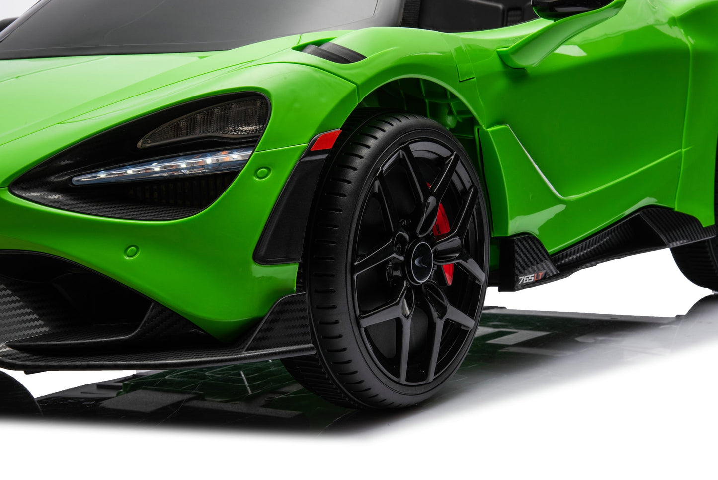 McLaren 765LT 12V Kids Ride-On Car in green with rubber tires, leather seat, LED lights, butterfly doors, parental remote control, and rechargeable battery.
electric-powered kids ride on car McLaren 765LT 12v