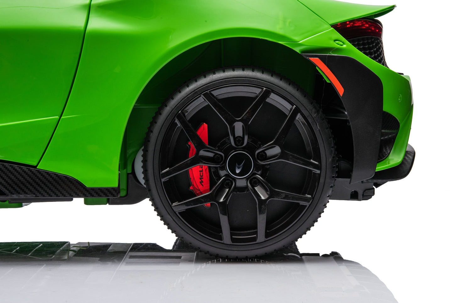 McLaren 765LT 12V Kids Ride-On Car in green with rubber tires, leather seat, LED lights, butterfly doors, parental remote control, and rechargeable battery.
electric-powered kids ride on car McLaren 765LT 12v