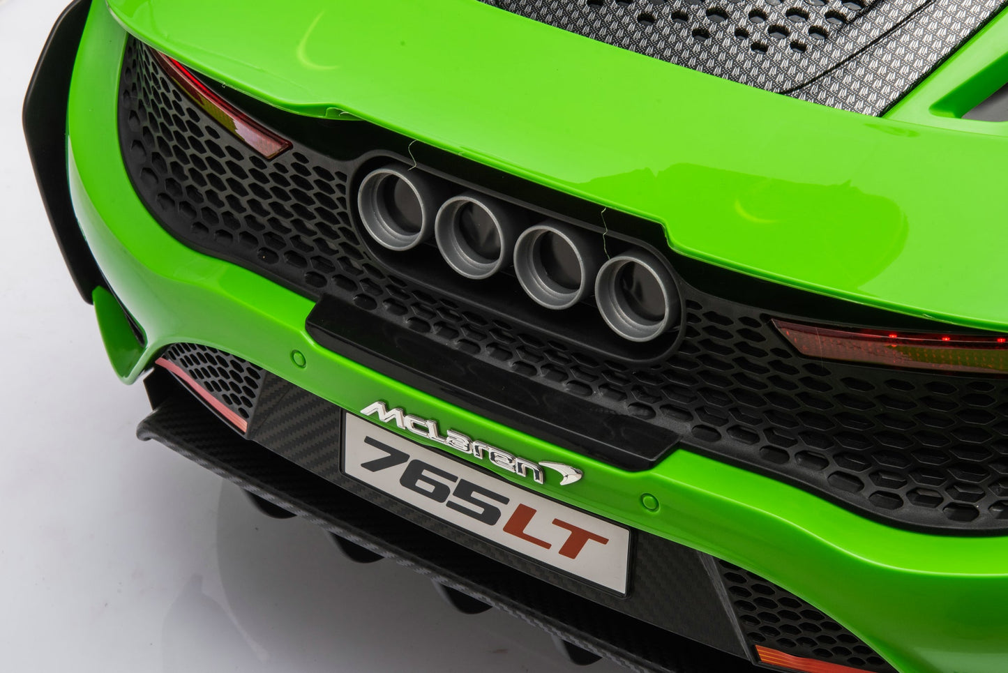 McLaren 765LT 12V Kids Ride-On Car in green with rubber tires, leather seat, LED lights, butterfly doors, parental remote control, and rechargeable battery.
electric-powered kids ride on car McLaren 765LT 12v