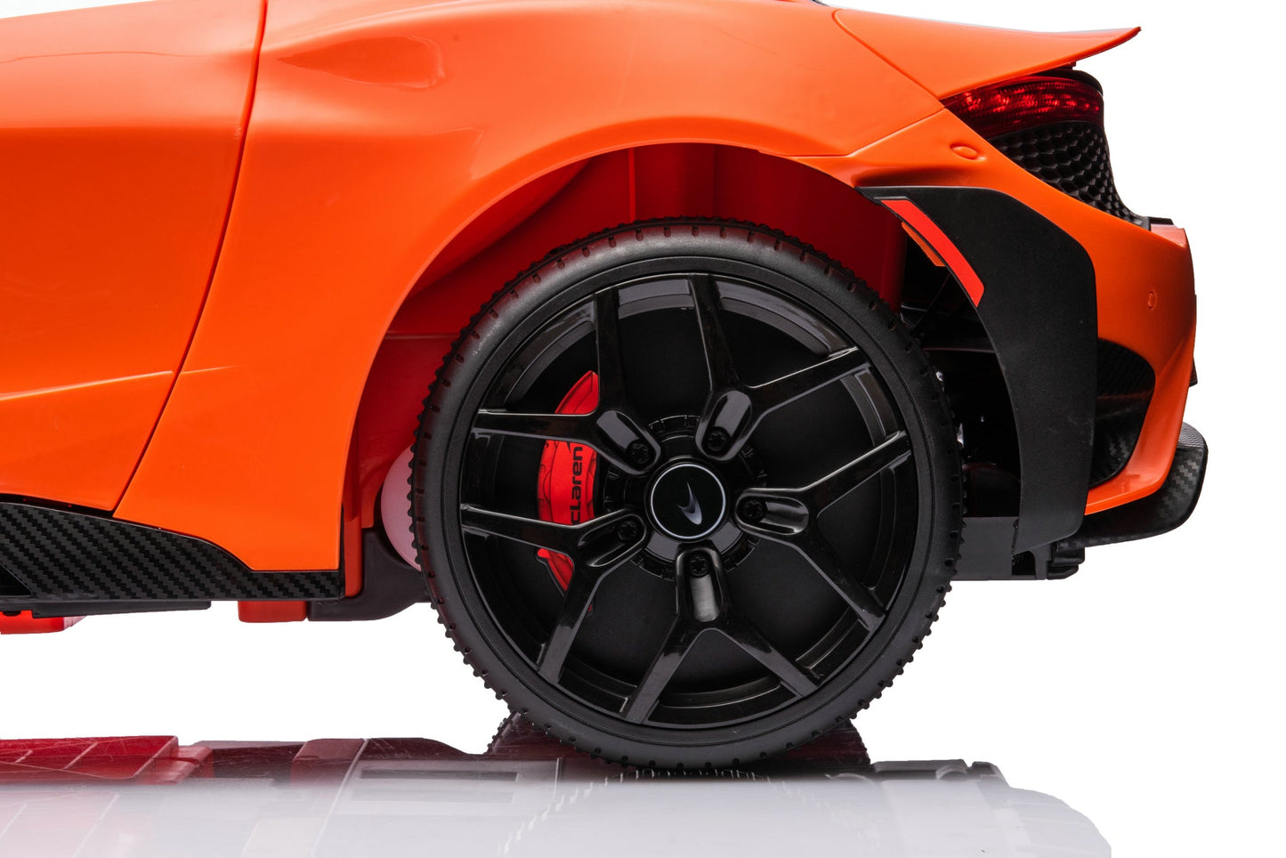 McLaren 765LT 12V Kids Ride-On Car in orange with rubber tires, leather seat, LED lights, butterfly doors, parental remote control, and rechargeable battery.
electric-powered kids ride on car McLaren 765LT 12v