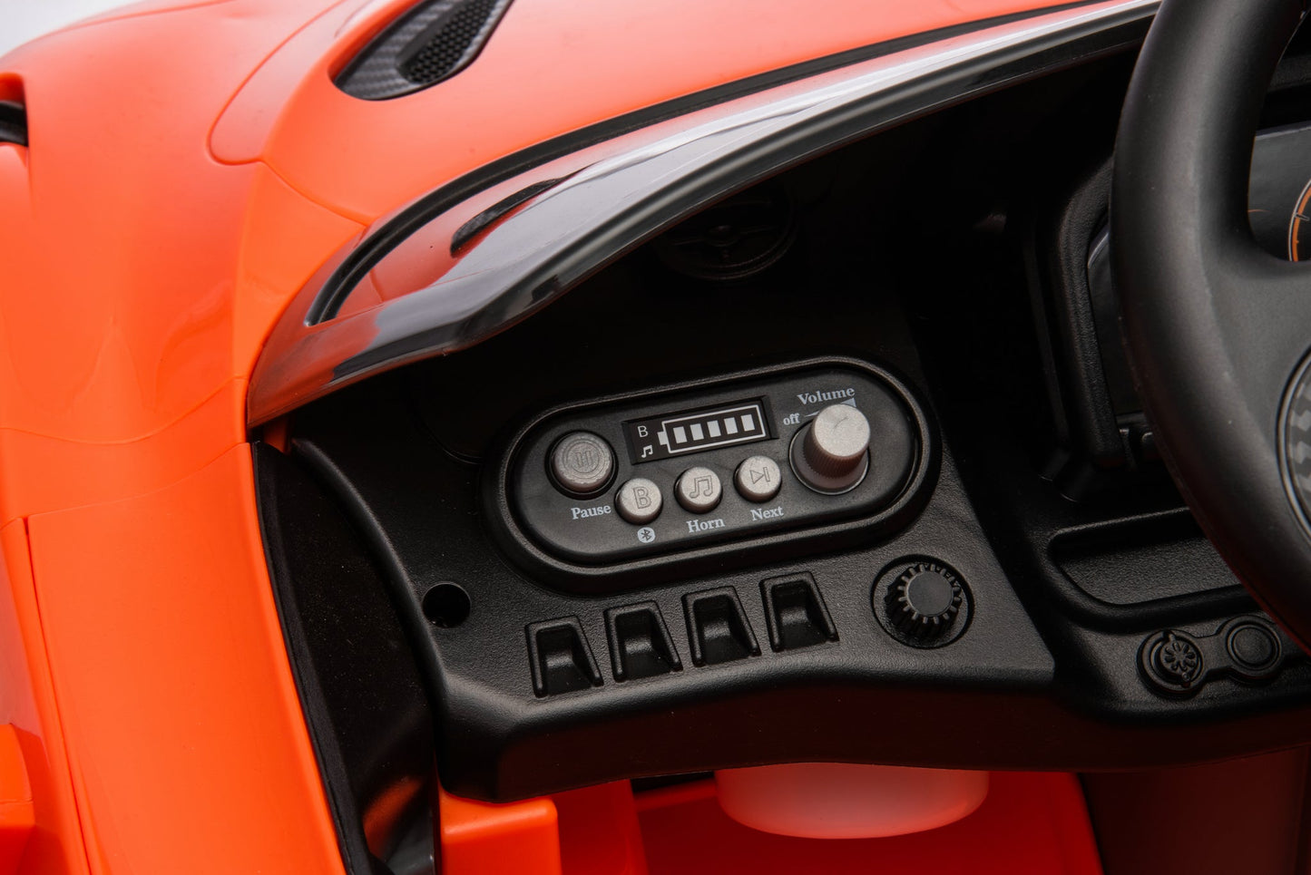 McLaren 765LT 12V Kids Ride-On Car in orange with rubber tires, leather seat, LED lights, butterfly doors, parental remote control, and rechargeable battery.
electric-powered kids ride on car McLaren 765LT 12v