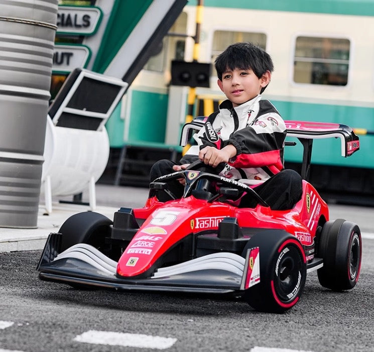 Formula F1 24V Kids Ride-On Go-Kart with brushless motor, drifting rear wheels, LED glow lights, leather seat, Bluetooth stereo, parental remote control, metal chassis, and dual-size adjustable pedals for kids and small adults. High-speed 24V battery-powered electric racing go-kart for ultimate fun and performance