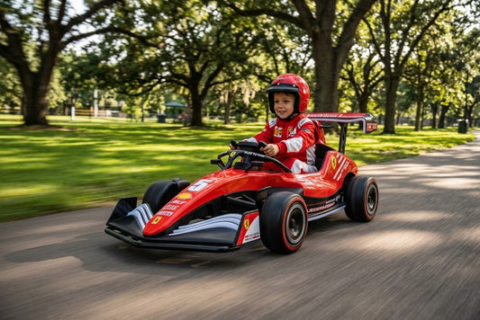 A child driving a red Formula F1 24V brushless electric go-kart at high speed along a smooth paved path in a scenic park, with lush greenery and dynamic motion blur capturing the thrill of the ride