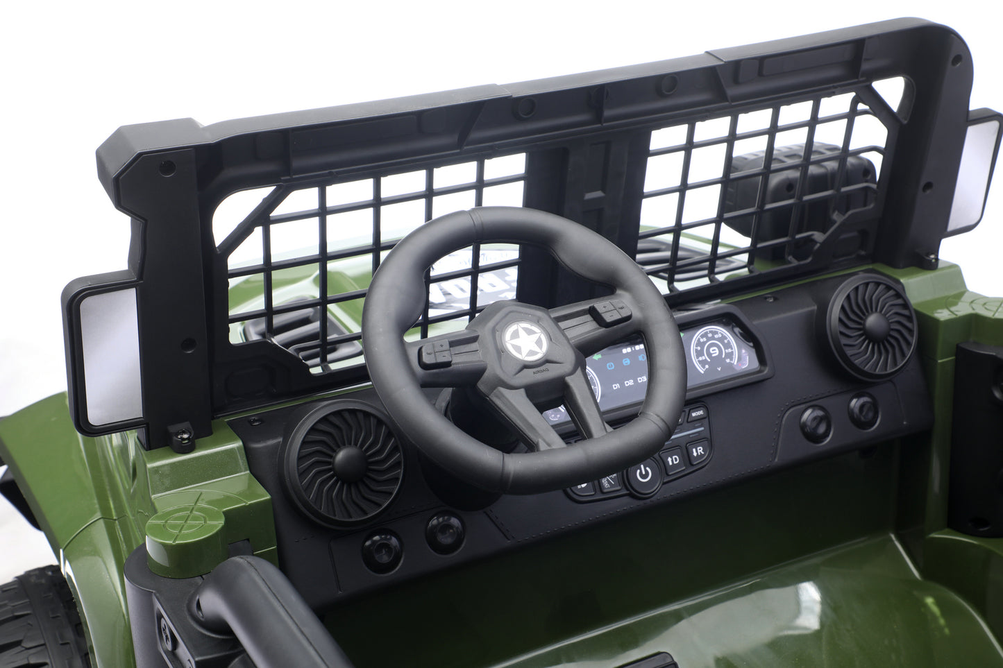 Close-up of a green and black children's ride-on 24v jeep vehicle cockpit, showing the steering wheel, dashboard controls, side mirrors, and front grille.
