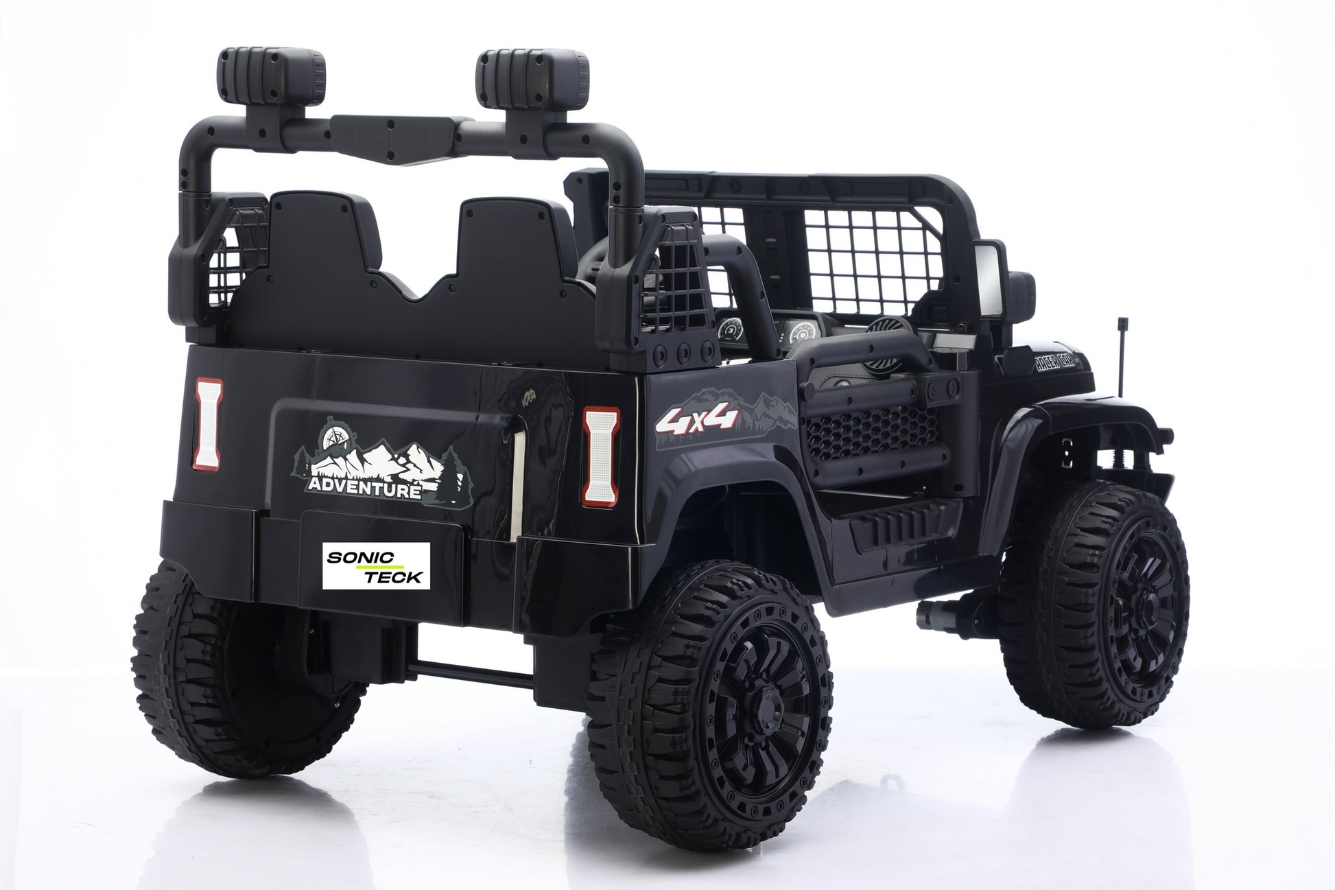 Black toy off-road jeep with large rugged tires, roll bars, and decorative decals including 'SONIC TECK' and '4x4' on a white background.