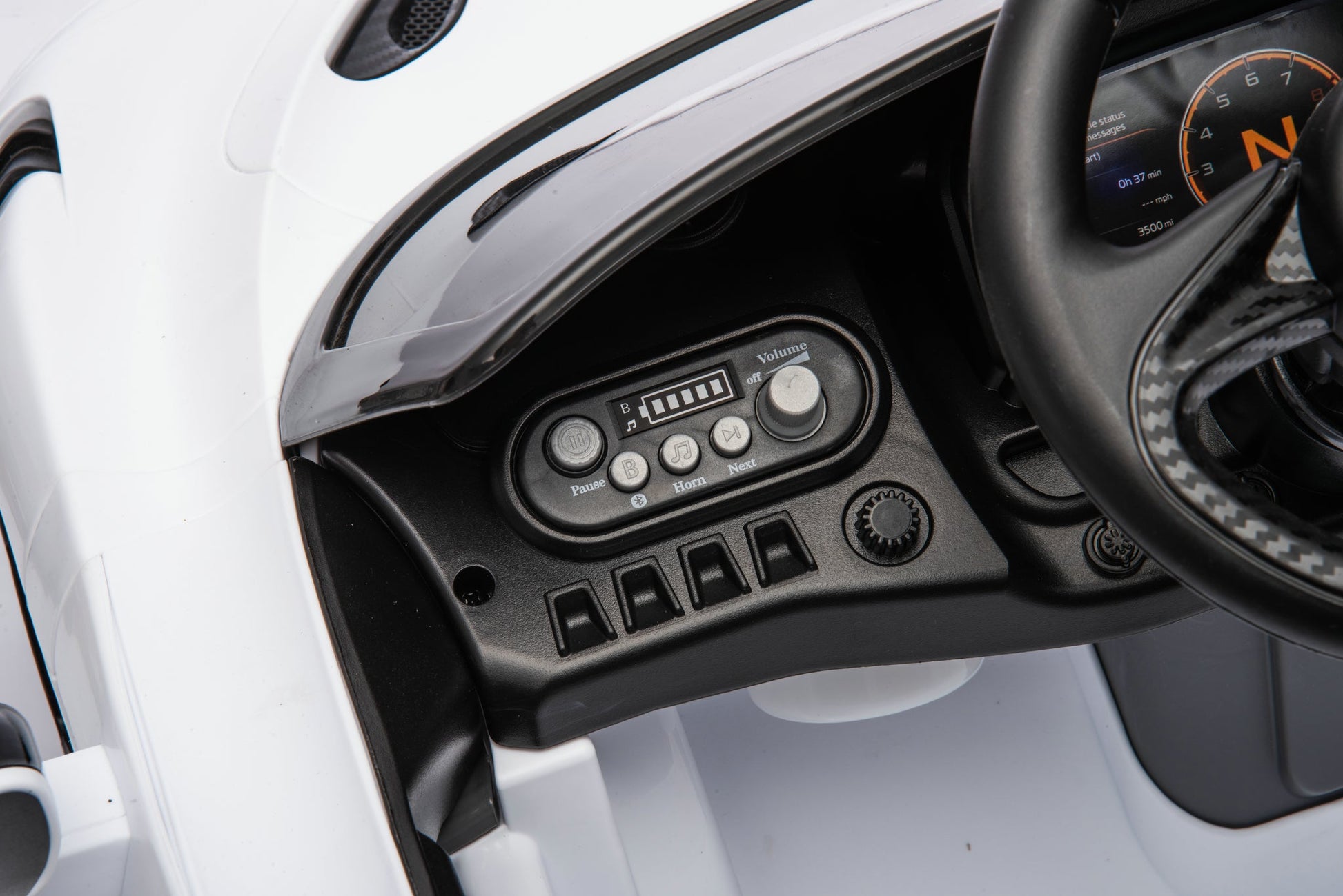 McLaren 765LT 12V Kids Ride-On Car in white with rubber tires, leather seat, LED lights, butterfly doors, parental remote control, and rechargeable battery.