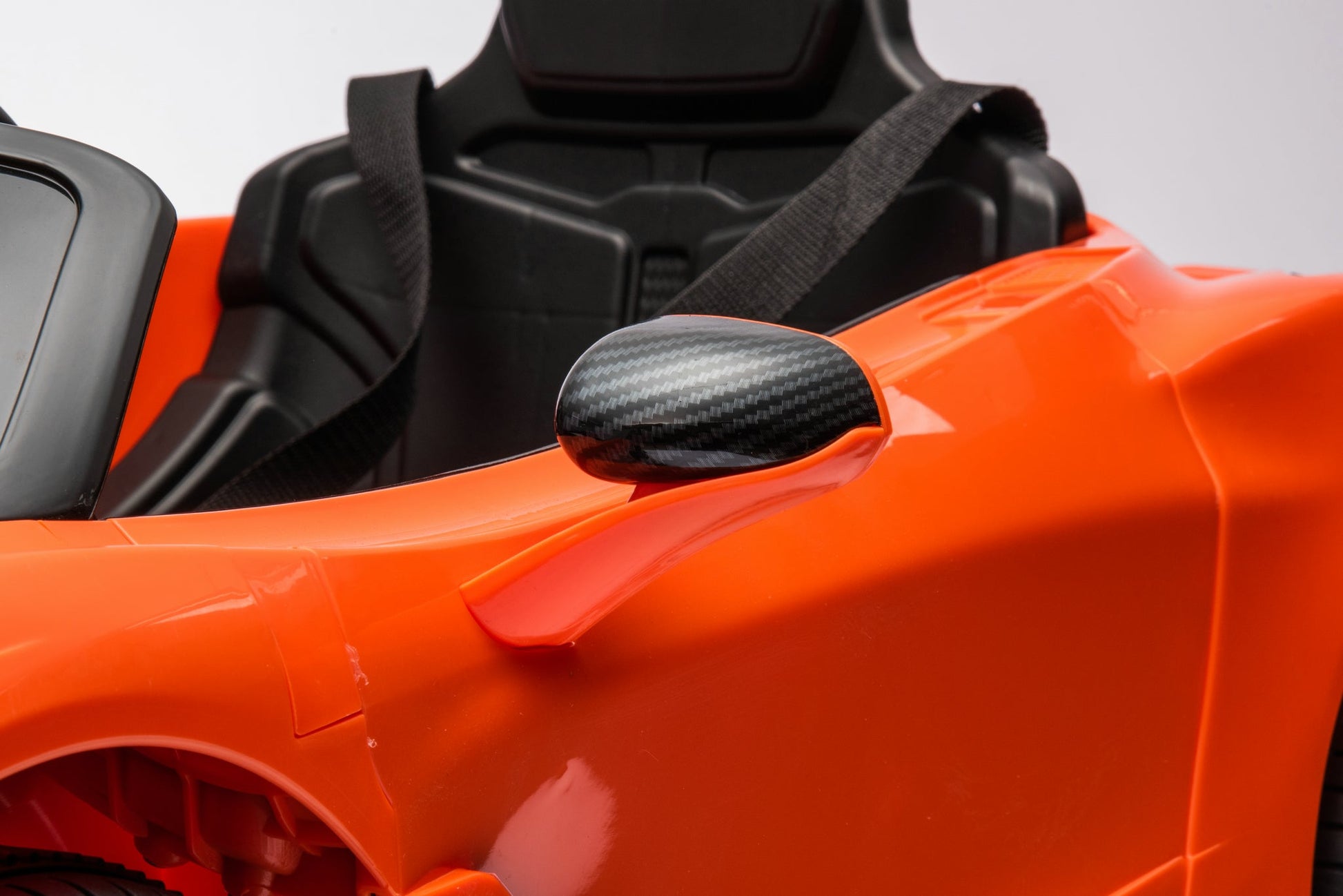McLaren 765LT 12V Kids Ride-On Car in orange with rubber tires, leather seat, LED lights, butterfly doors, parental remote control, and rechargeable battery.
electric-powered kids ride on car McLaren 765LT 12v