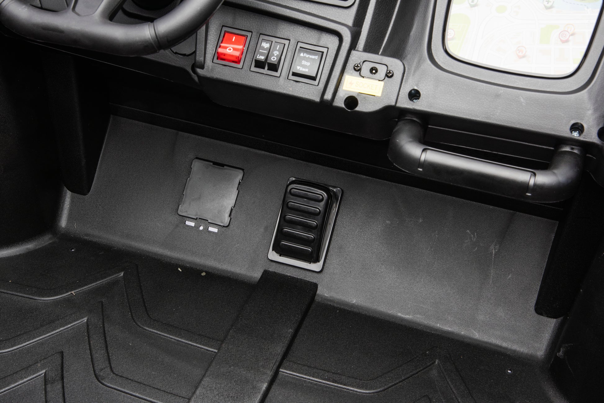 Interior view of the Apex XXL 24V kids ride-on UTV.