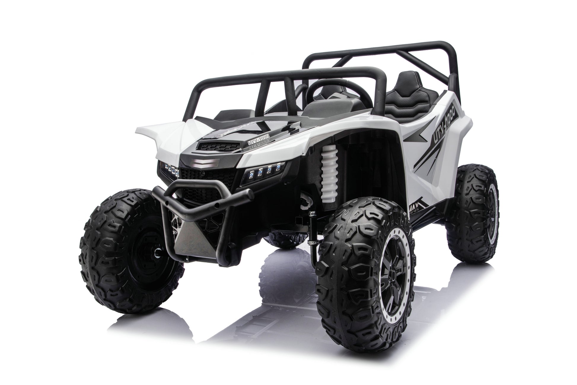 A white and black electric ride-on toy UTV with large off-road tires, a roll cage, and a black seat, shown on a clean white background with a soft reflection.