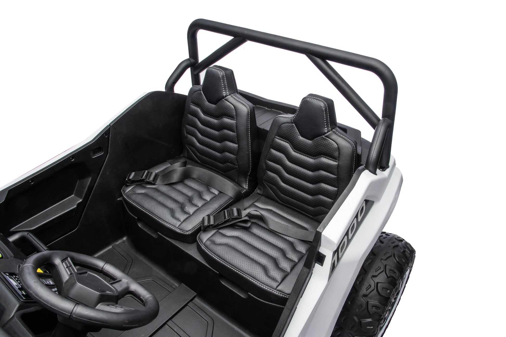 Black textured bucket seat covers with integrated shoulder straps, shown installed on the front of a white and black toy vehicle with a roll bar, on a white background.
