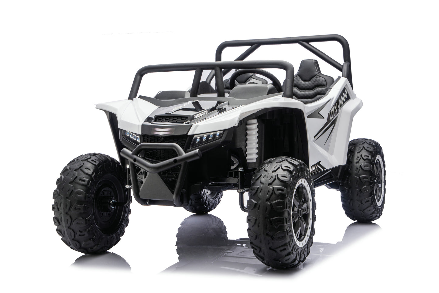 A white and black four-wheel electric ride-on UTV toy with large off-road tires, a roll cage, and a front bumper guard, shown on a white background with a reflection.
