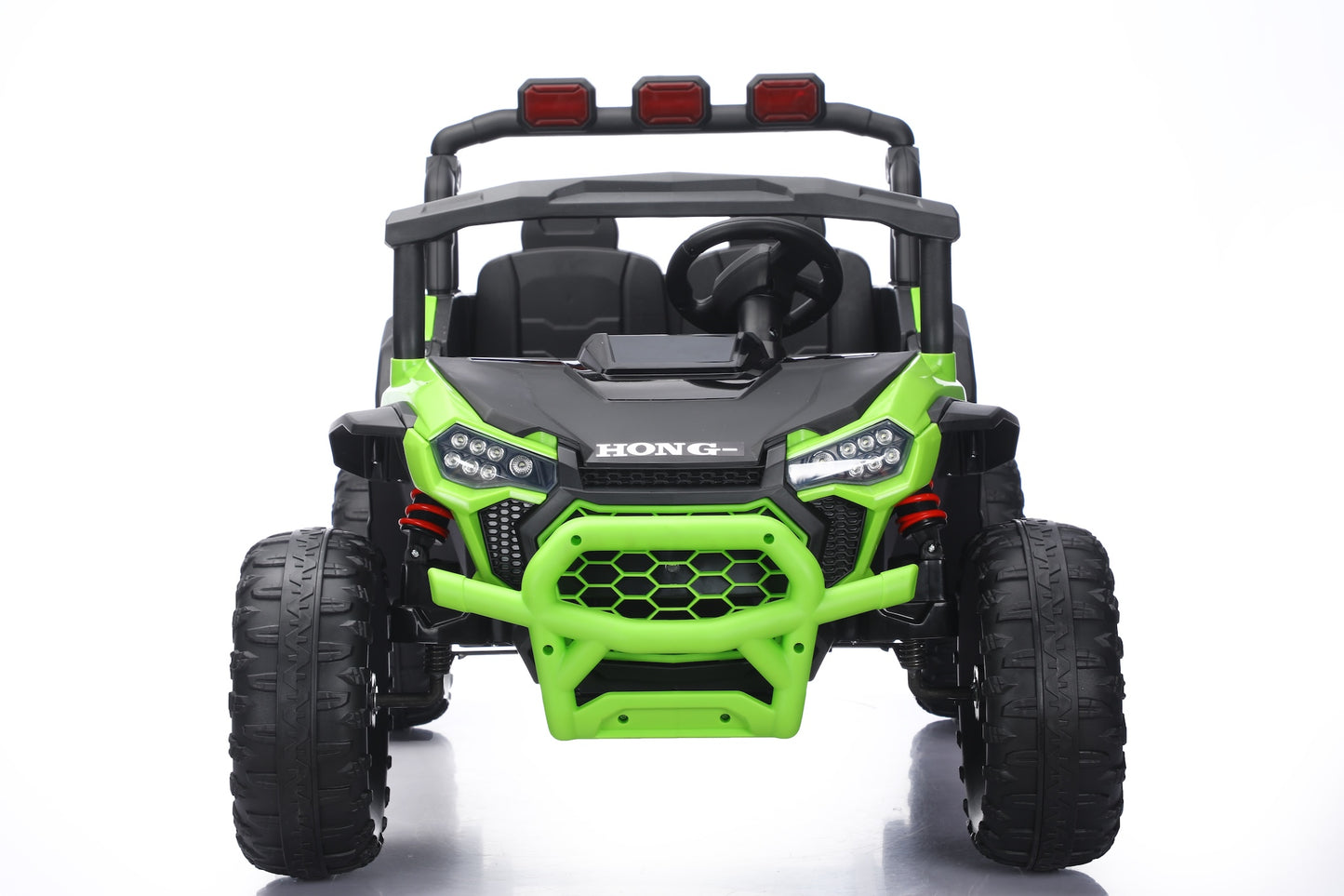 A bright lime green and black kids' electric ride-on UTV toy with a roll cage, large off-road tires, and a roof-mounted light bar, shown from the front on a white background.