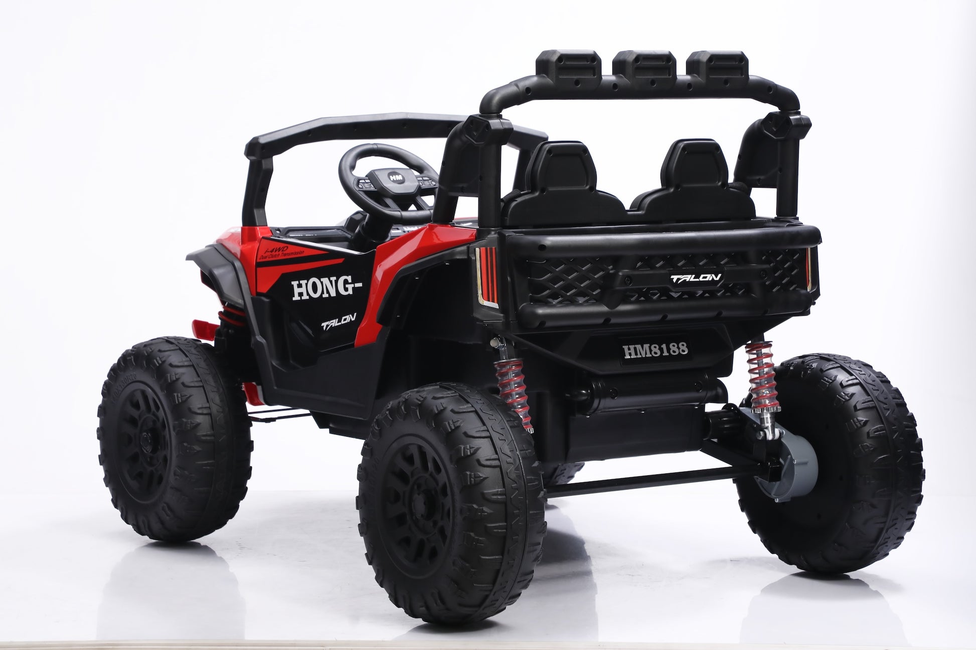 A red and black 4-seat electric ride-on off-road buggy with large off-road tires, shown from a three-quarter rear angle on a white studio background.