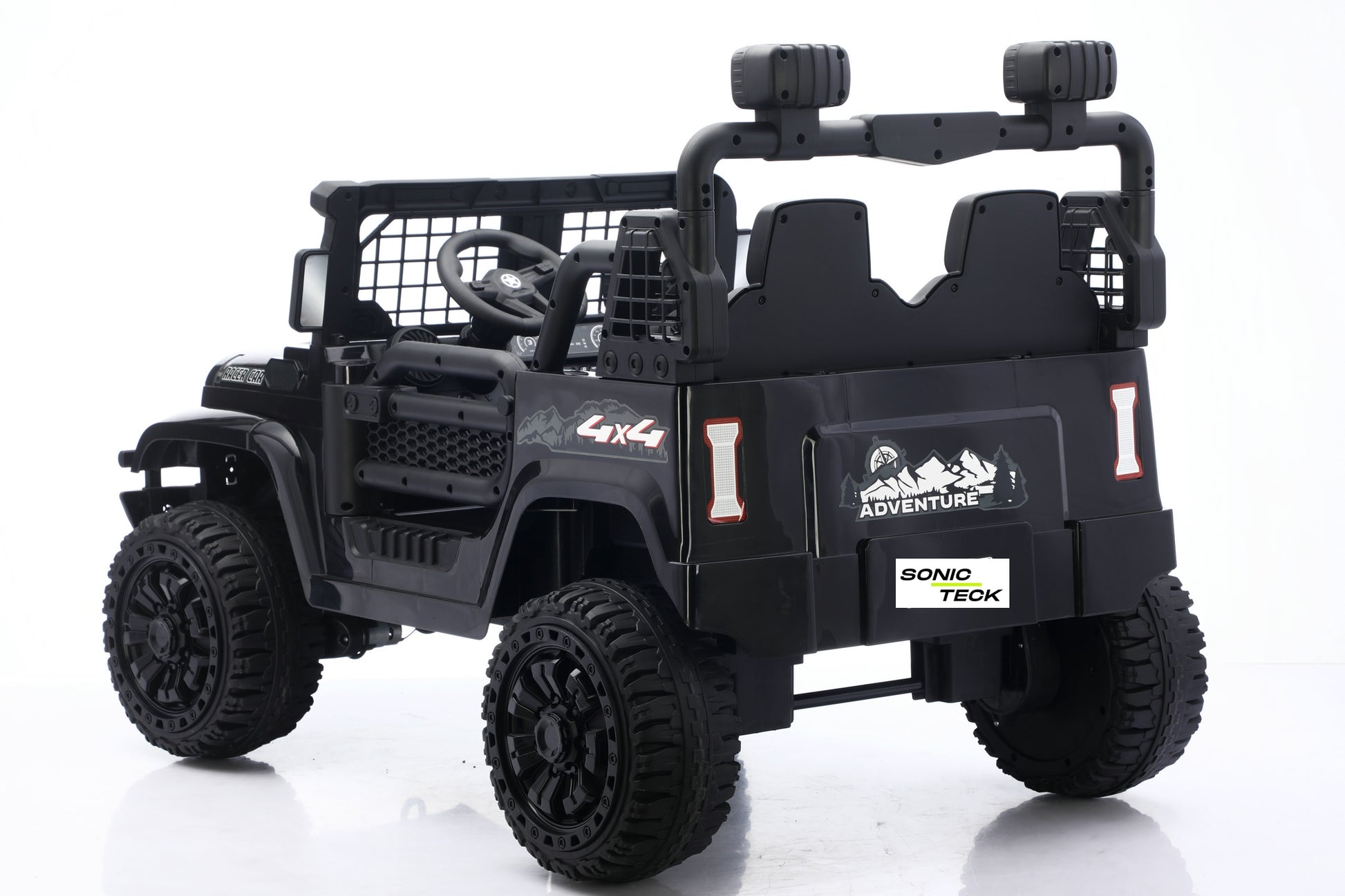 Black 4x4 toy off-road vehicle with dual seats, roll cage, and large black tires, shown on a white background.