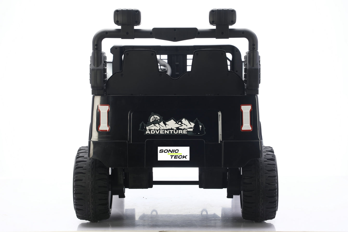 Black Sonio Teck kids' ride-on vehicle shown from the rear view, featuring dual seats, roll bar, and rugged tires on a white background.
